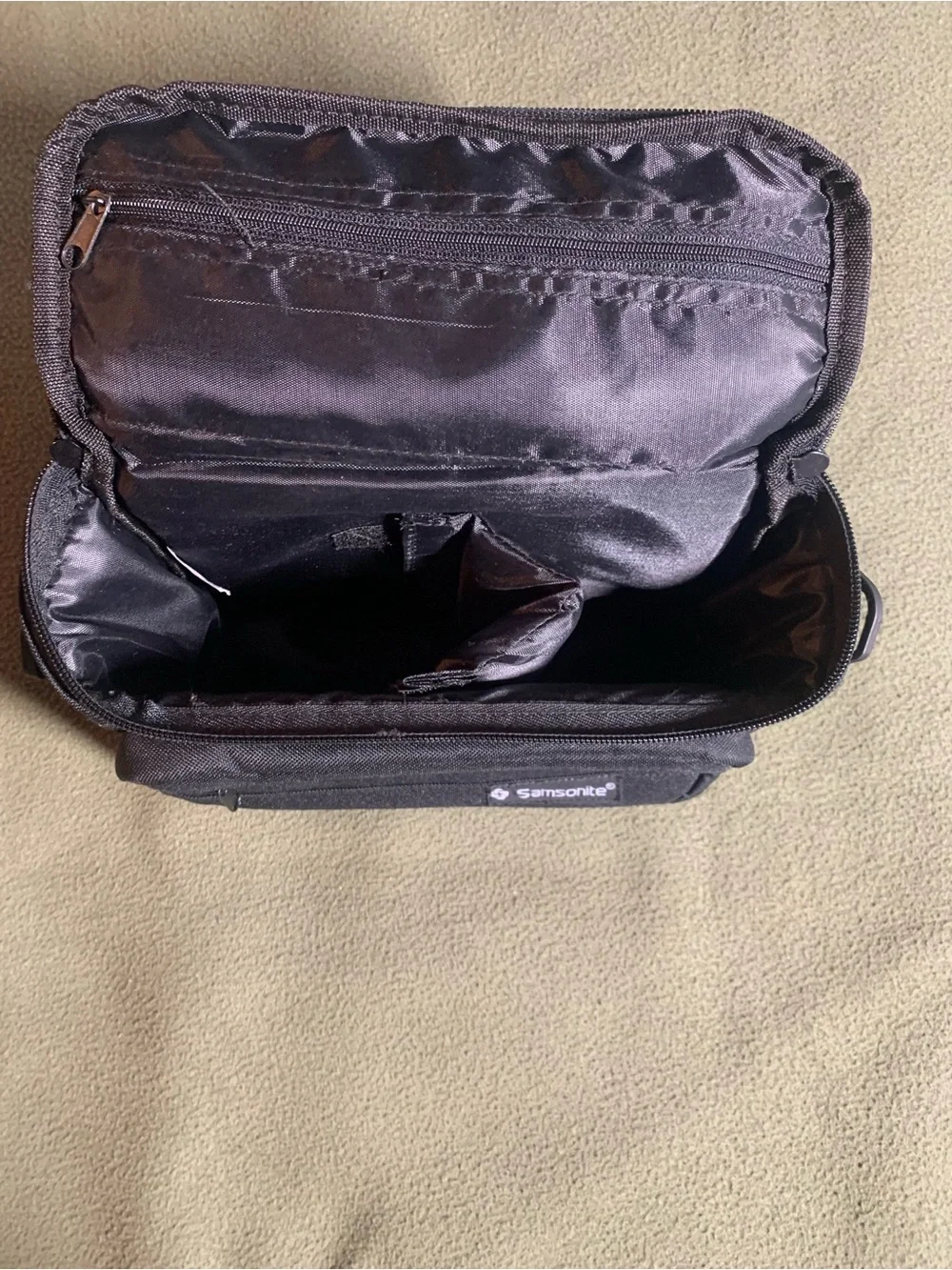 New Samsonite black padded camera/camcorder bag. Approx 9.5” x 6.5” x 4”